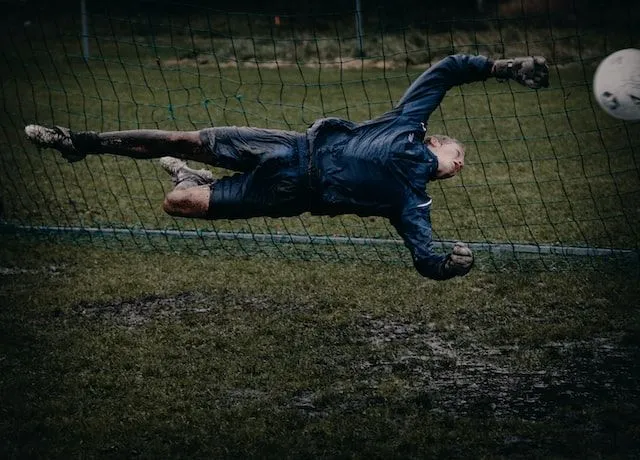 Playing soccer in the rain keeper